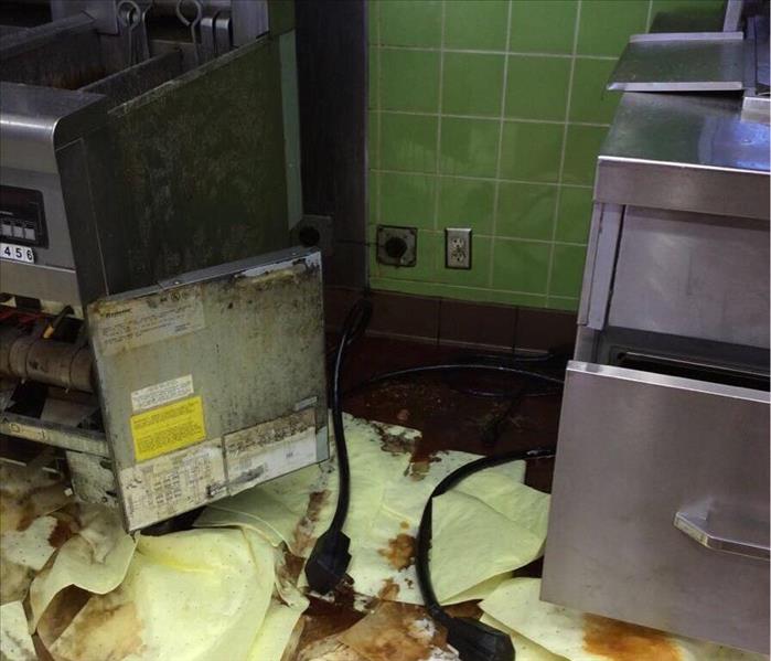 Grease everywhere after the fryer overflowed